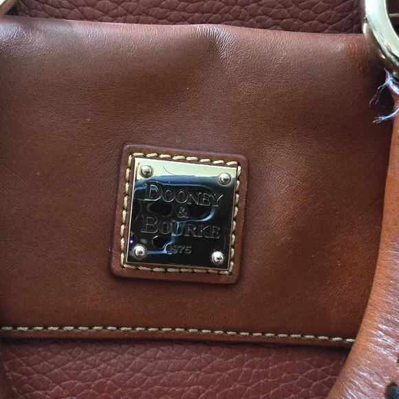 Beautiful red leather Dooney & Bourke purse with crossbody option